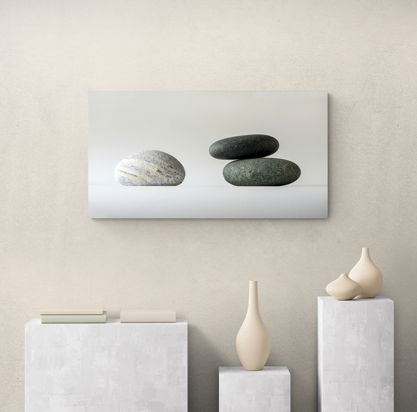 Three rocks on a white background